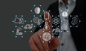 Palec dotyka ekranu z ikonami symbolizującymi technologię, finanse i zabezpieczenie.