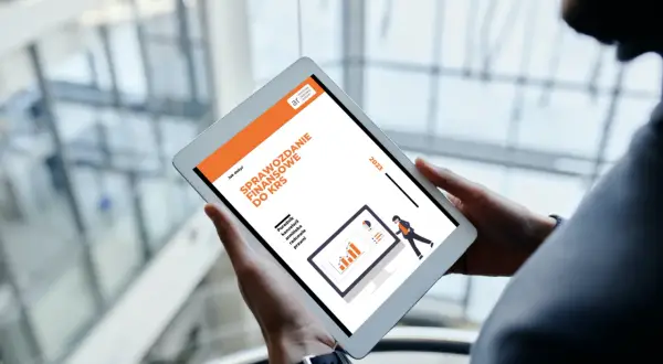 Tablet z grafiką przedstawiającą sprawozdanie finansowe do KRS.
